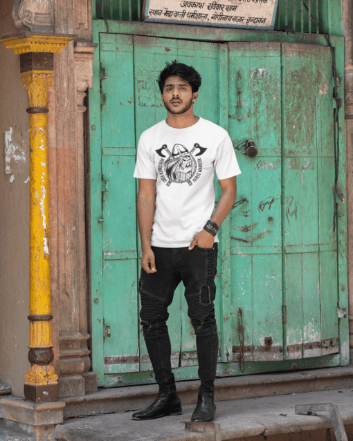 mockup of a man wearing a tee and posing in front of an old door m26132 - Varegue